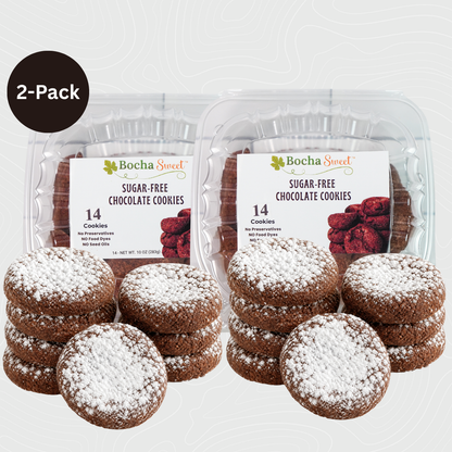 Two packages of Snow-Dusted Chocolate Cookies, each containing 14 rich fudgy chocolate cookies generously dusted with powdered sugar, 10 oz per package.
