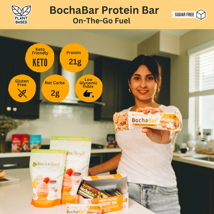 BochaBar Vanilla Almond Crunch in hand of girl with keto friendly, 21g protein, gluten free, and 2g net carbs