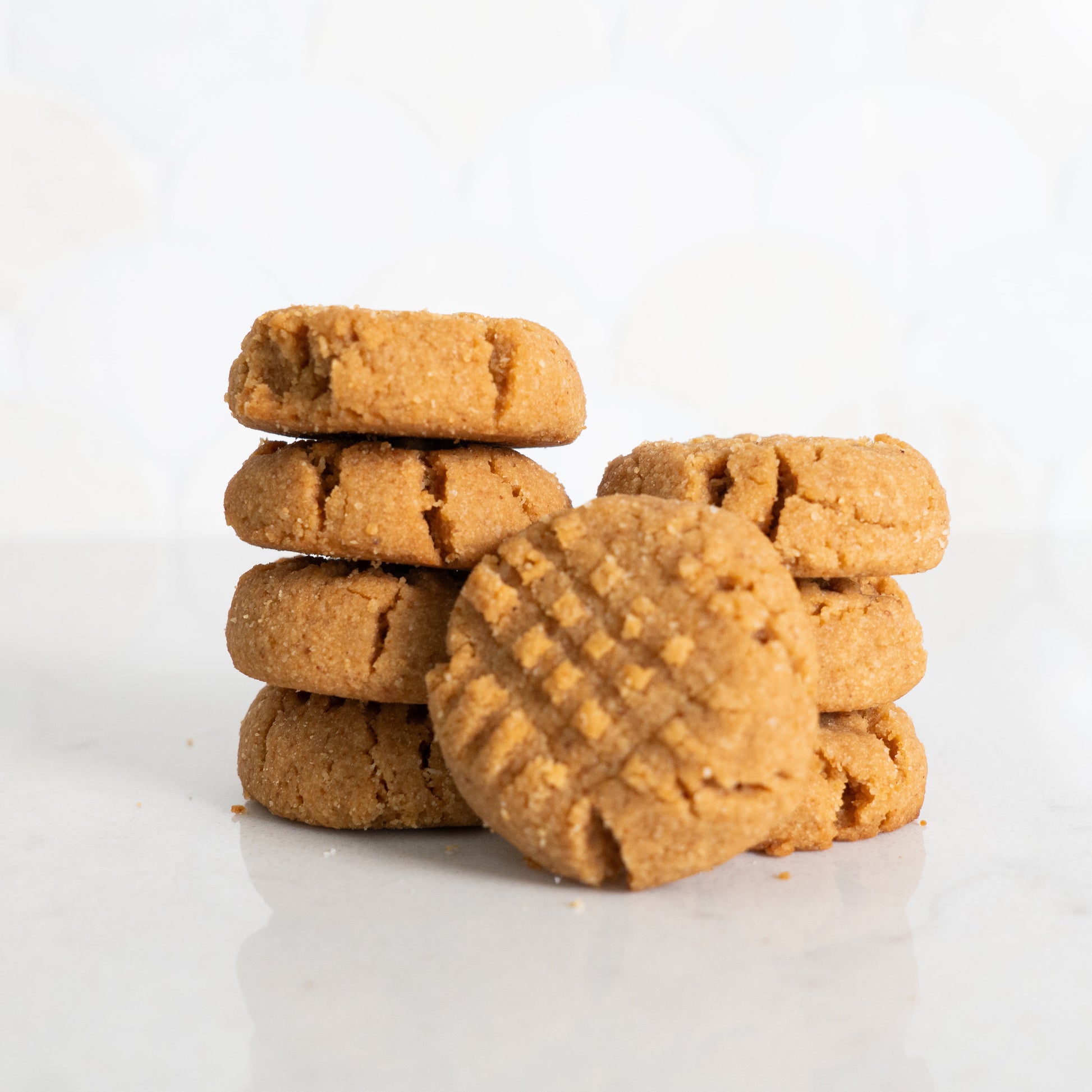 Indulge in the irresistible flavor of our Keto Peanut Butter Cookies, a deliciously tender and melt-in-your-mouth treat packed with the bold taste of real peanut butter. Made with clean, wholesome ingredients and no sugar, these cookies are the ultimate &nbsp;snack for anyone looking to stay on track without sacrificing flavor.