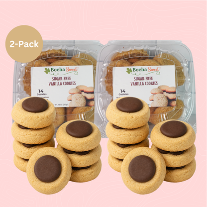 Two packages of Bocha Sweet sugar-free vanilla cookies with chocolate dome tops on a pink background.