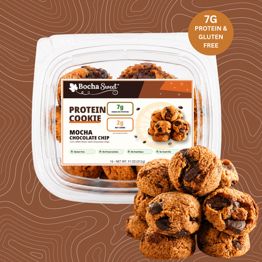 Packaged protein cookies with a label on a brown background