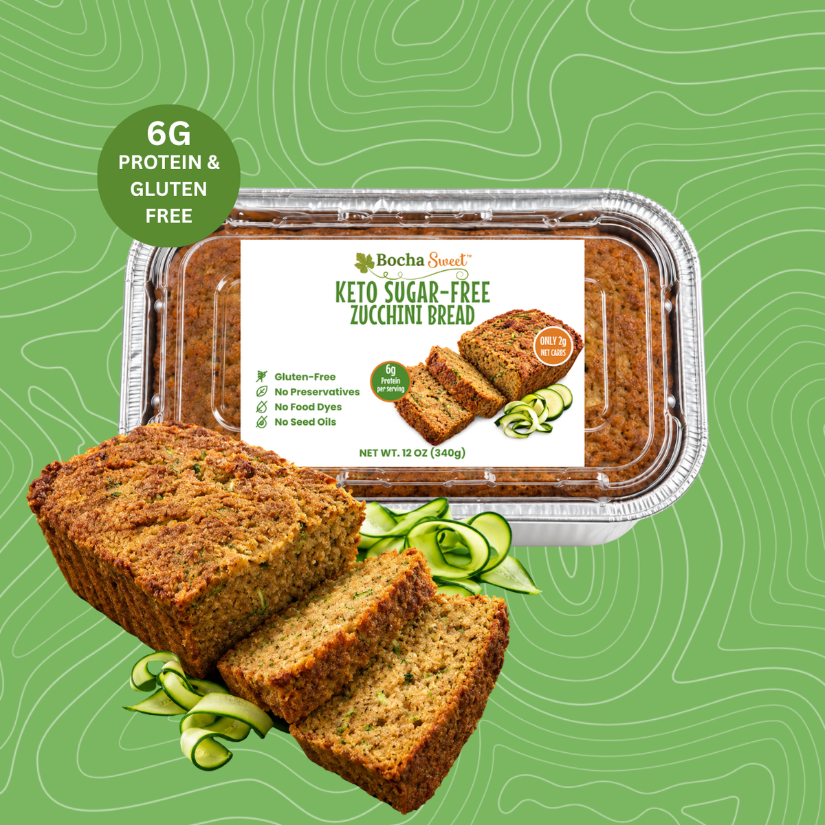 BochaSweet Keto Sugar-Free Zucchini Bread in clear packaging with a label showing 6g protein and 2g net carbs, beside a sliced loaf and zucchini ribbons on green