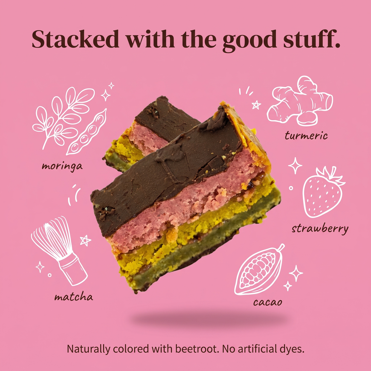 A pink promotional graphic showing a layered dessert bar slice with dark chocolate on top, pink filling, yellow-green layers, and a green base. White line drawings and text around it label ingredients including moringa, turmeric, strawberry, matcha, and cacao.
